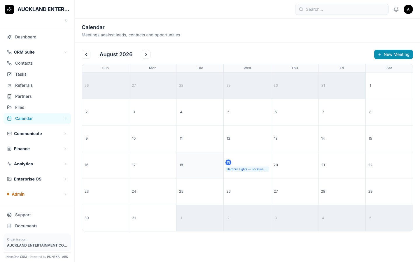 The Calendar screen showing a month view with booked meetings